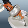 Using a drill style drain cleaner