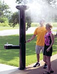 Misting station with built-in drinking fountains