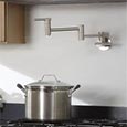 Wall mounted pot filler