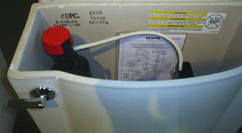 Kohler toilet tank number stamped onto side of tank