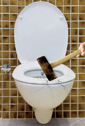 Sledgehammer smashing toilet