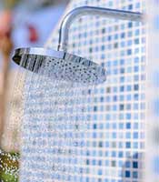 Wall mounted outdoor shower head and arm