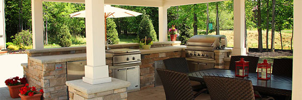 Sink in an outdoor kitchen - courtesy of Exscape Designs